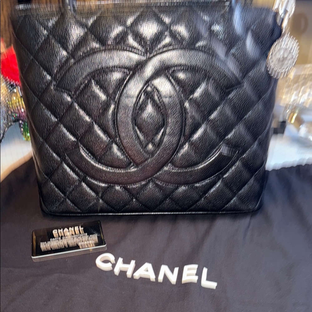 Chanel Quilted medallion silver caviar leather tote pristine condition 11x9x5”